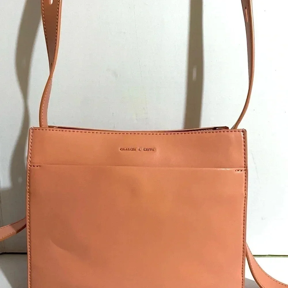 Charles & Keith pink poly crossbody handbag